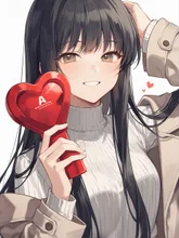手に持ってるのは…何だろ。